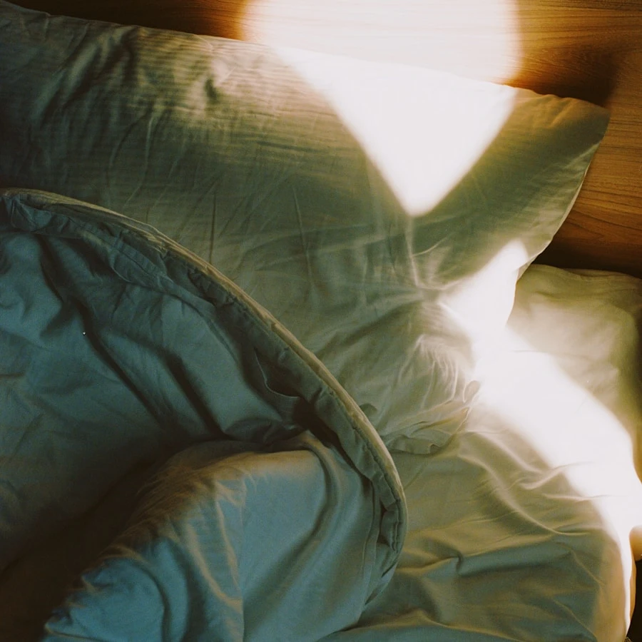 A serene hotel bedroom at dawn